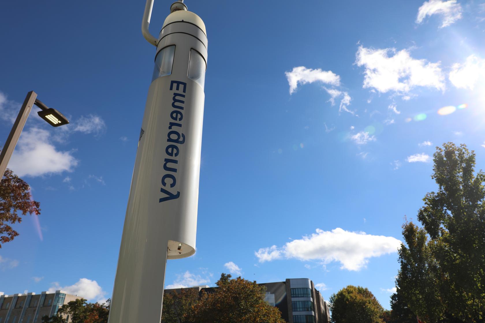 white emergency pole on campus